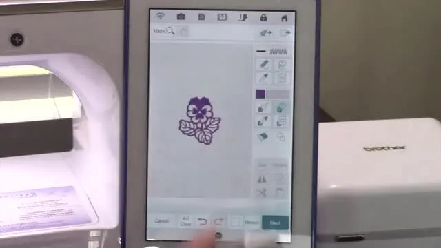 Close-up of the Luminaire XP screen using the flood fill bucket to color a lace flower design purple in My Design Center.