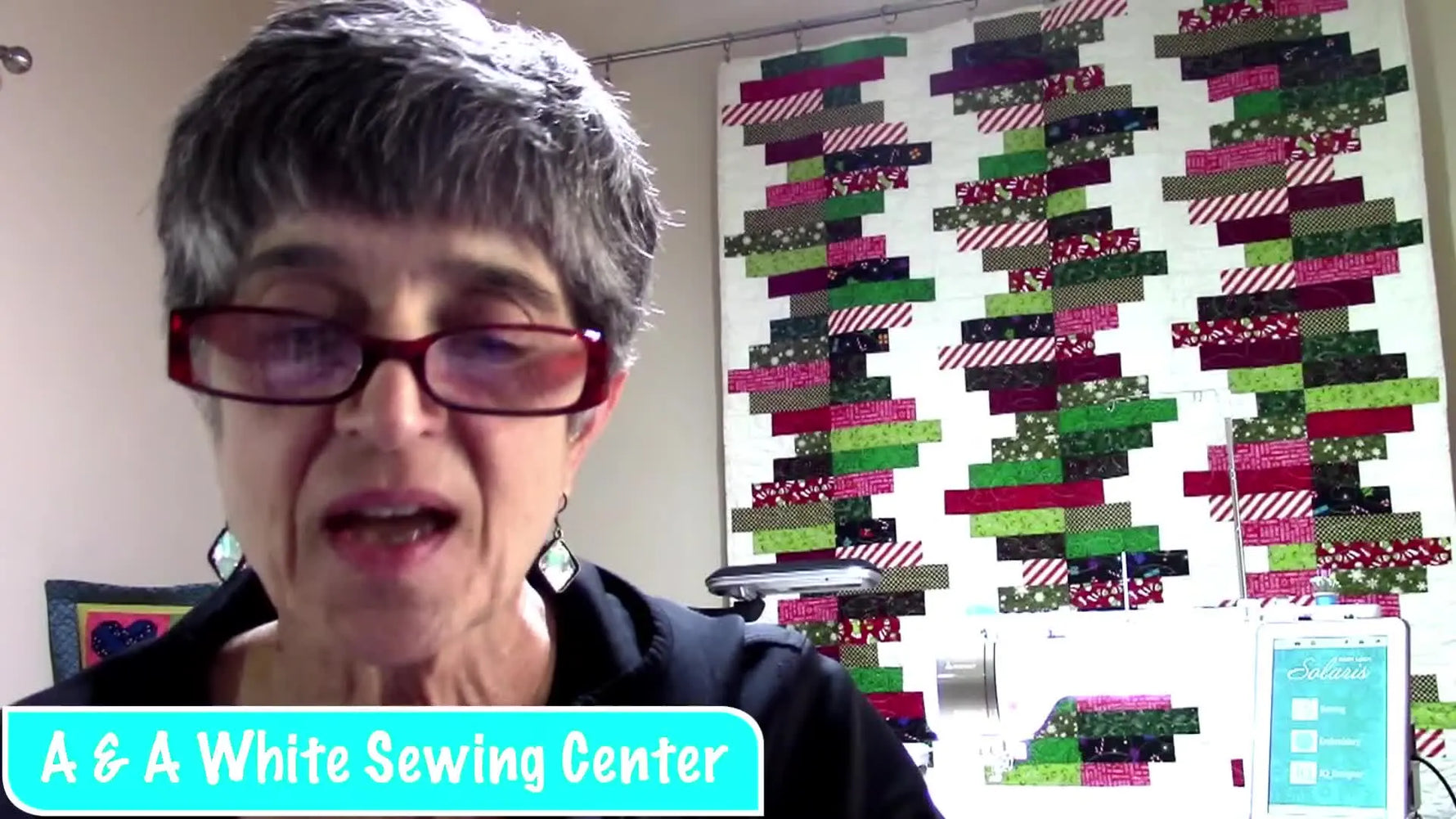 A screen preview of the finished LOVE design laid out on the Baby Lock Solaris grid before stitching.