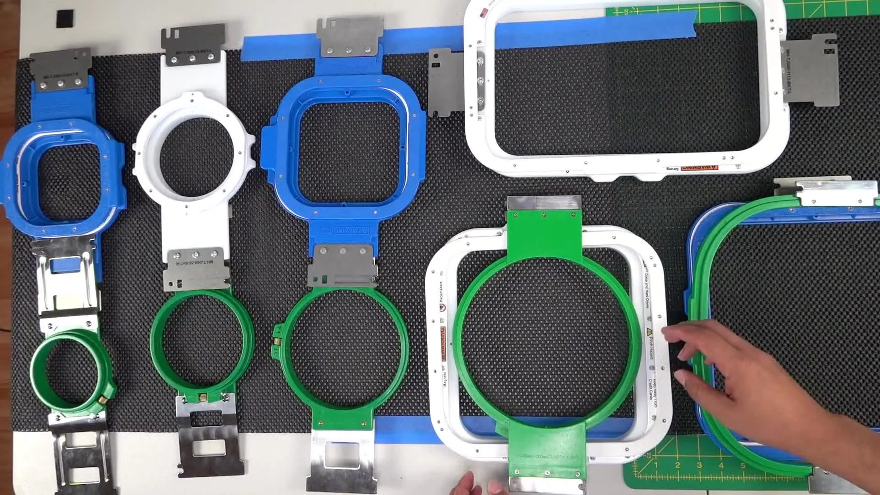 An overhead lineup of standard plastic hoops A–F placed beside their magnetic hoop equivalents for an at-a-glance size comparison.