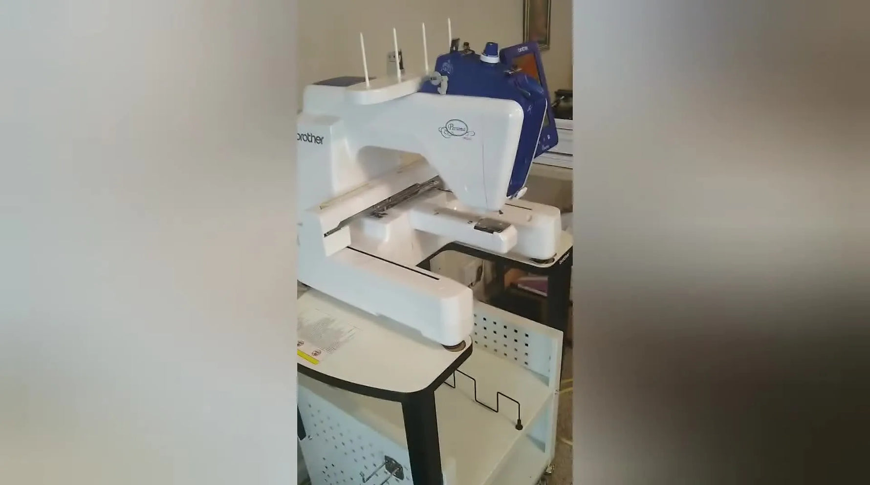 A fully assembled Brother PRS100 Persona mounted securely on its stand, ready for the first hooped T-shirt stitch-out.