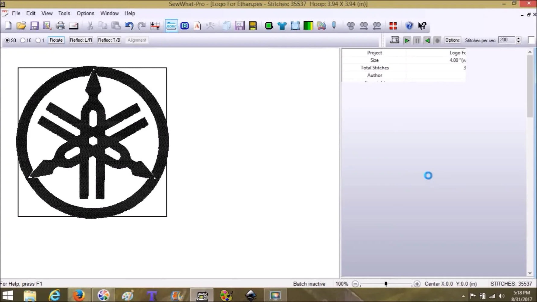 A screen capture shows the finished design with the name “Abe” placed next to a logo on the SewWhat‑Pro workspace grid.