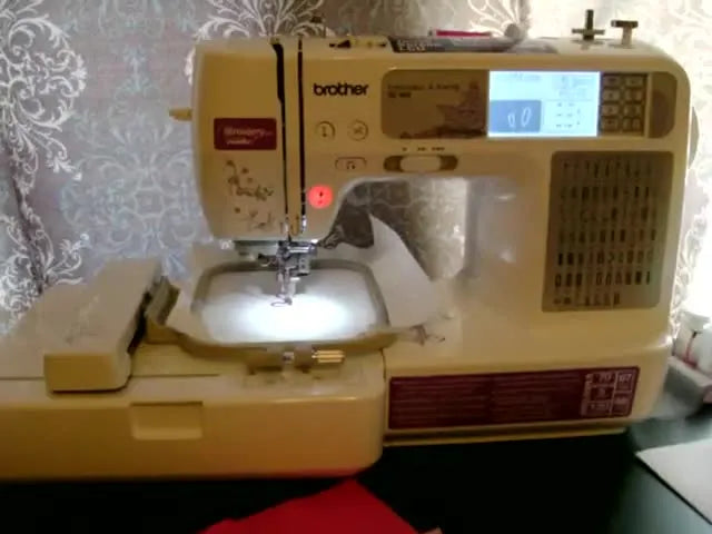 A wide view of the Brother SE-400 with the LCD screen lit, ready for an embroidery project.