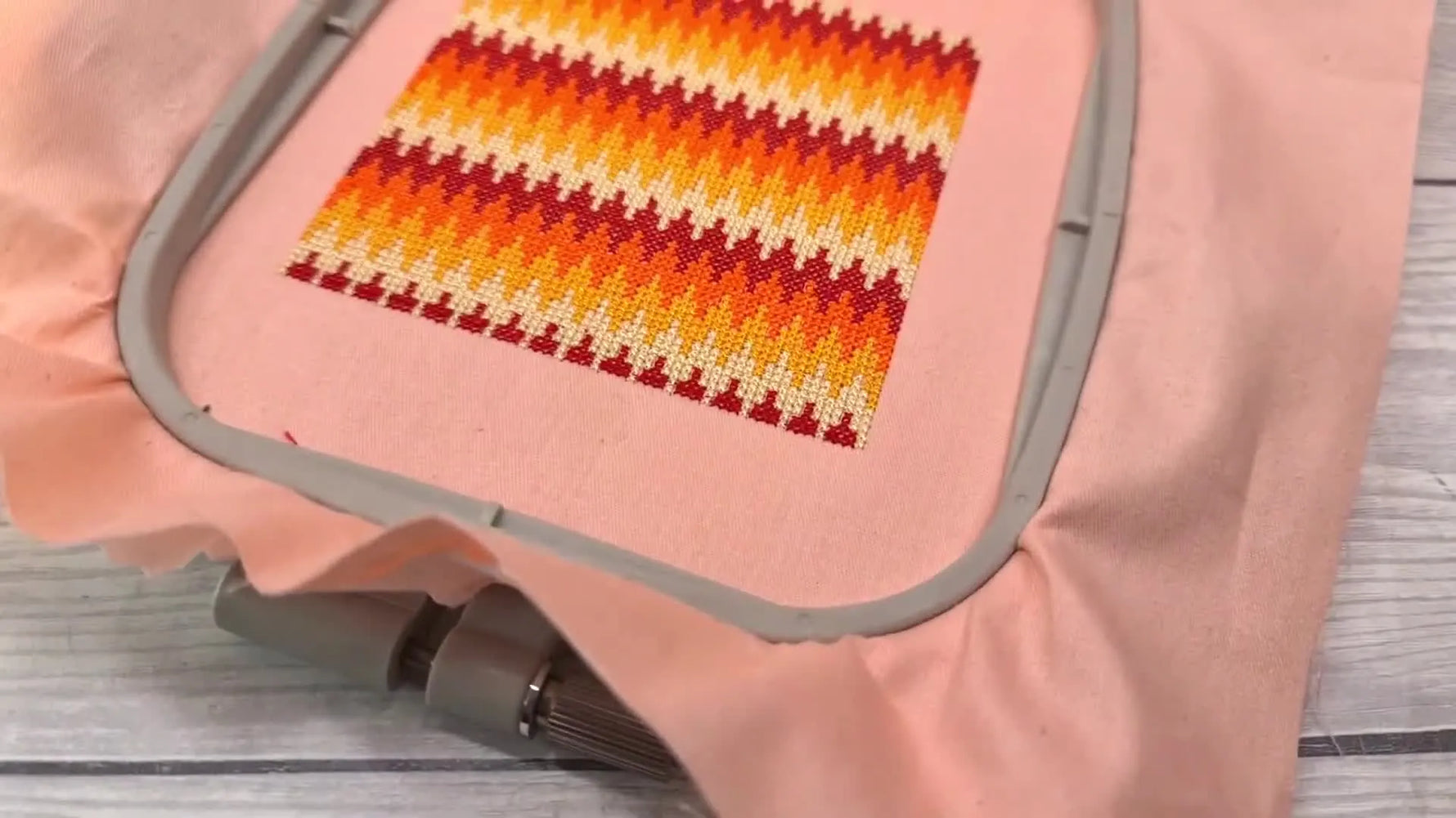 Completed Bargello cross-stitch pattern in an embroidery hoop