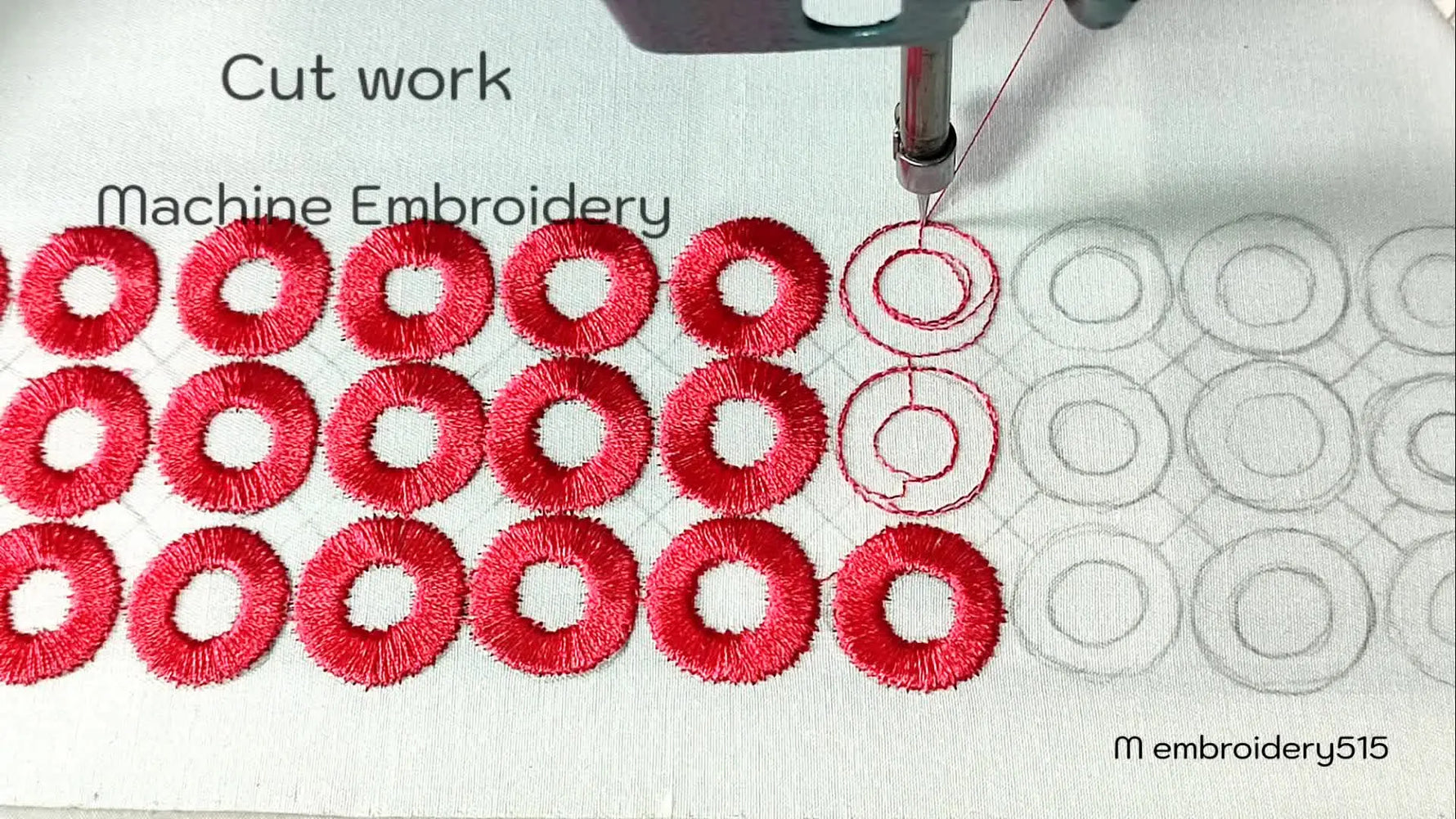 Machine embroidery in progress, showing red circles being outlined.