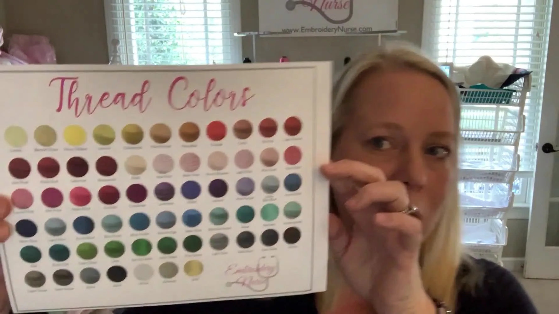 A close-up of a Floriani thread color chart with realistic thread textures and labeled color names for quick customer selection.