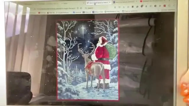 A close-up view of the OESD “Starry Night Santa” design on-screen, showing the shaded artwork that demands accurate thread preparation.