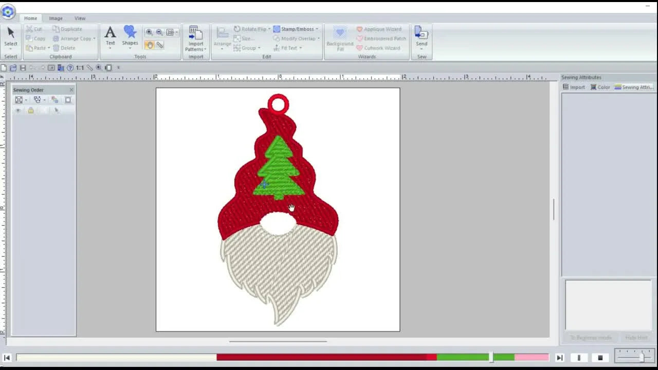 A near-finished digital stitch simulation of the Christmas gnome with the green tree detail already stitched on the hat.
