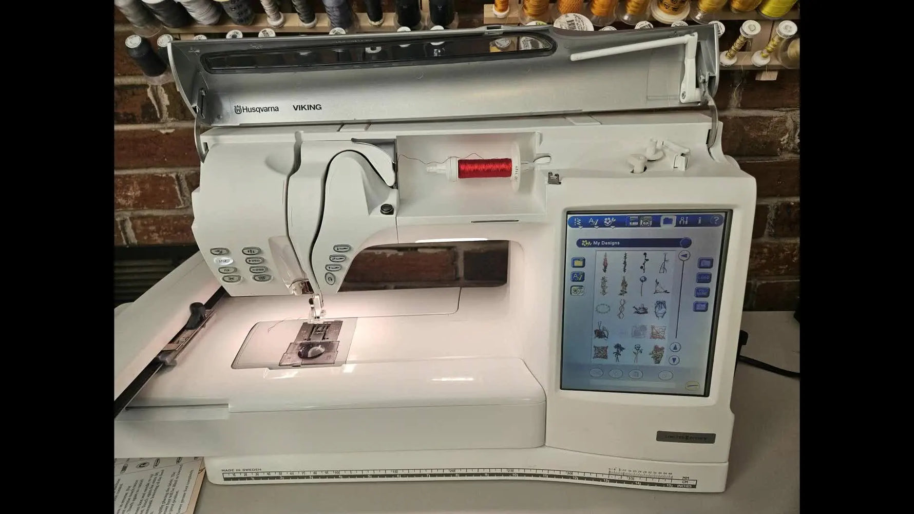 A Husqvarna Viking Designer SE Limited Edition with the embroidery unit attached, ready for a full sewing-and-embroidery workflow.