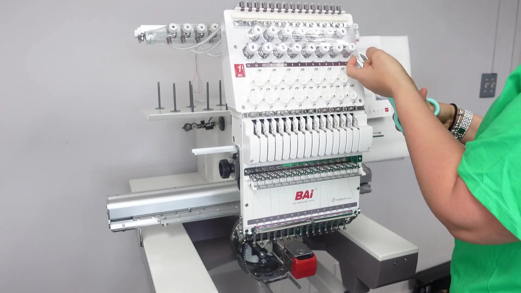 A fully set up BAI 15-needle machine with threads installed and needles ready for the first test stitch.