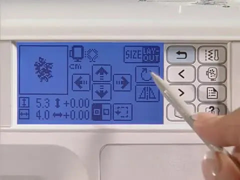 The embroidery machine’s rotation menu on the LCD shows 90°, 10°, and 1° options for precise design alignment.