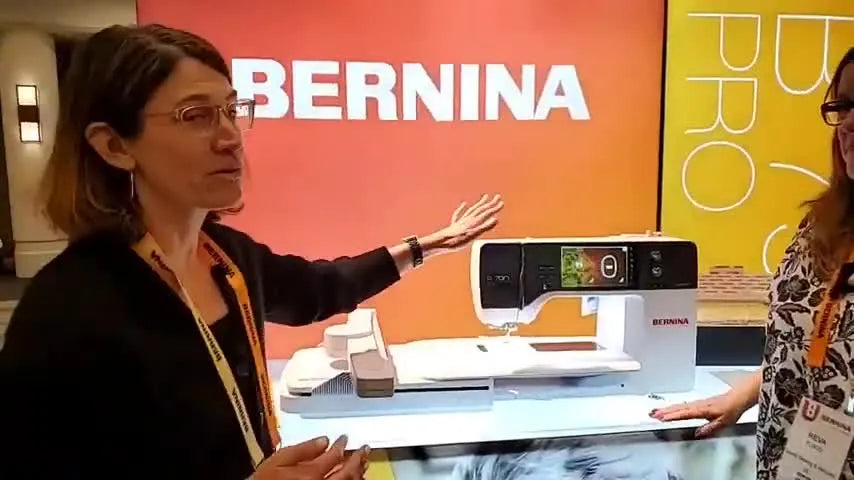 A wide view of the Bernina 790 Pro on a demo stand, the machine that introduces the pinpoint laser and faster, quieter embroidery workflow.
