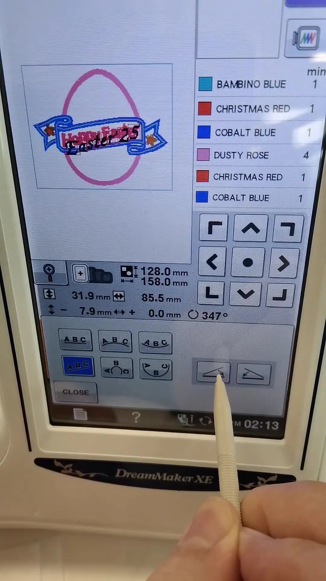 The Brother DreamMaker XE screen shows straight lettering transformed into a clean curved arc using the Array controls and arrow adjustments.