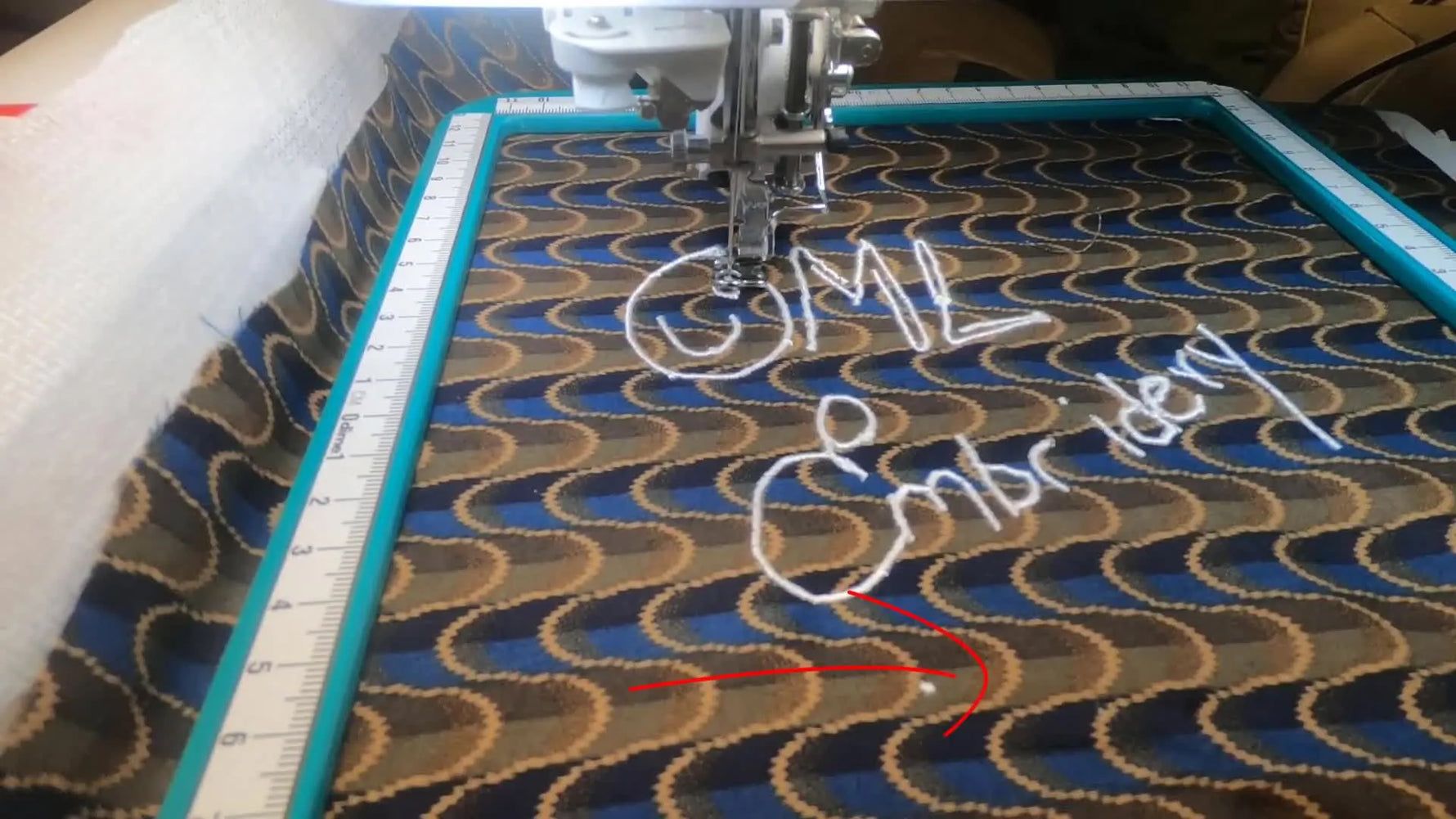 A side-by-side view compares the original handwritten drawing with the finished embroidered satin-stitch result on fabric.