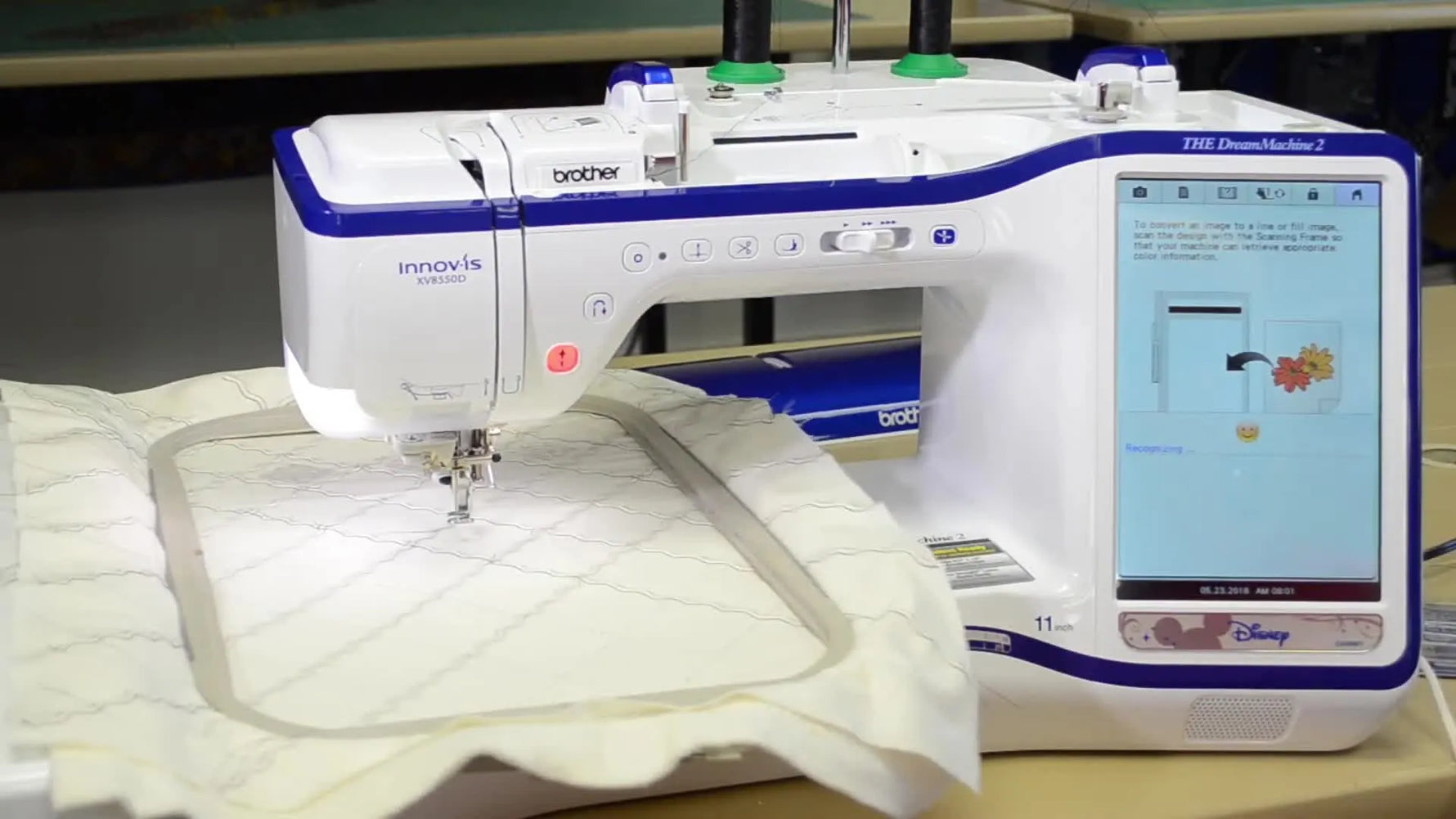 The Brother Dream Machine screen shows a completed scan of the quilted grid, ready for on-screen editing and precise embroidery placement.
