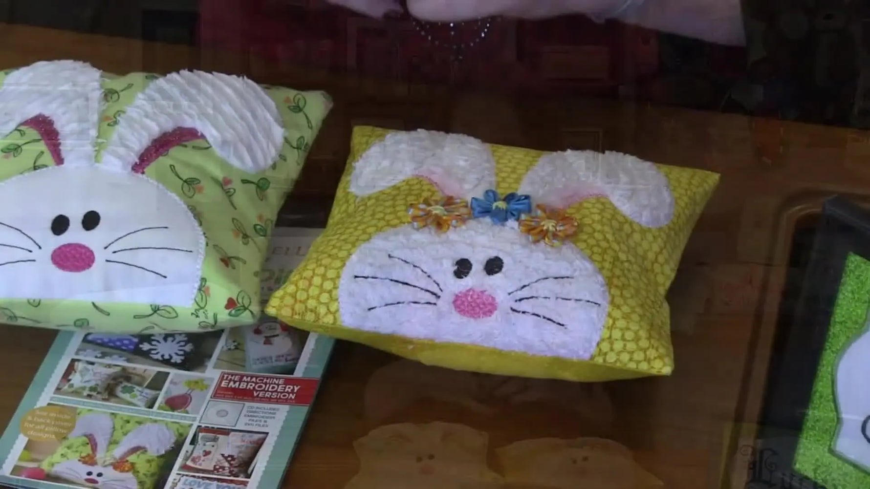 Two finished bunny pillows are shown side-by-side to highlight how different fabric choices (felt versus chenille/minky) change the final texture and look.