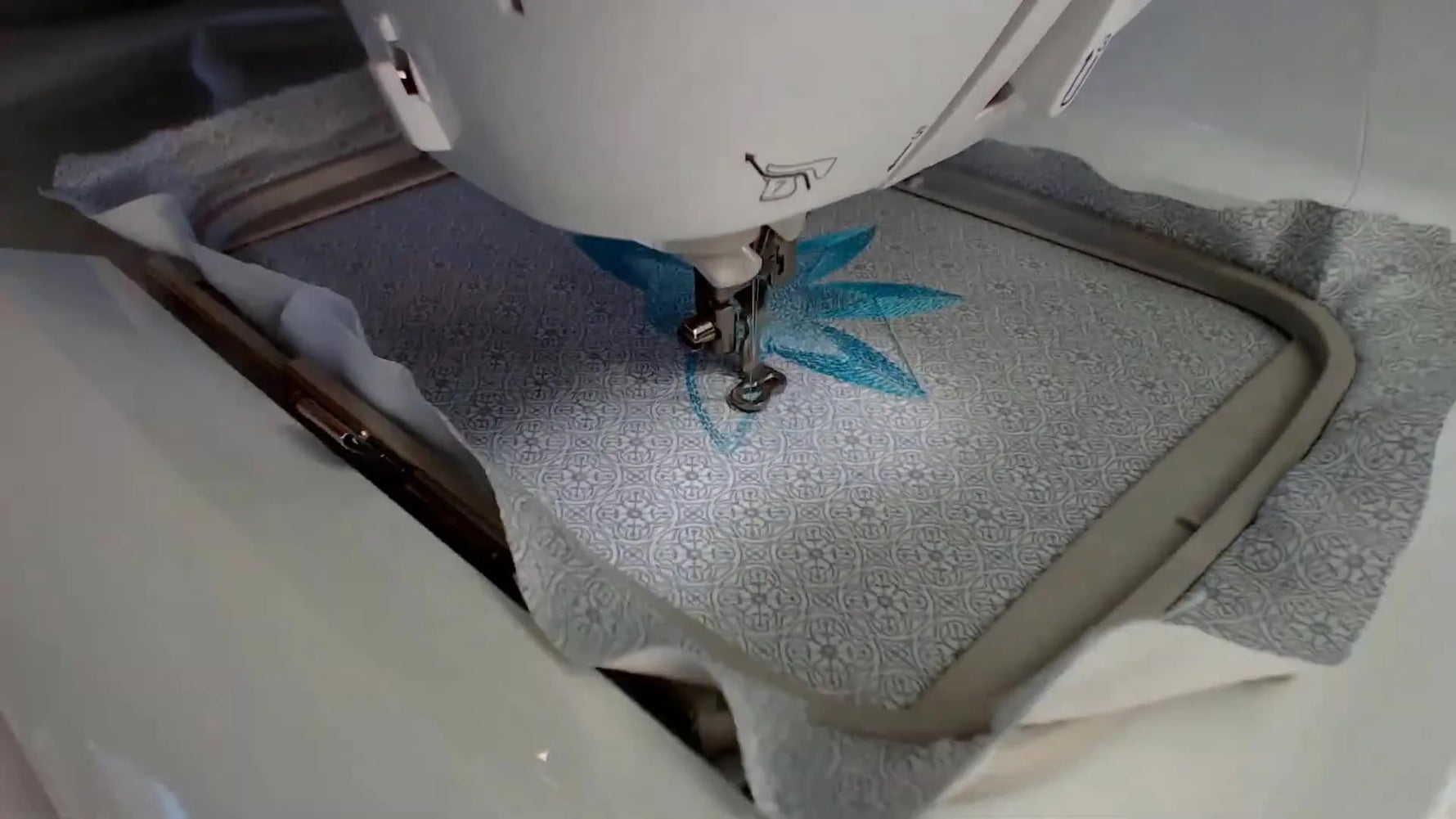 Embroidery machine stitching initial outline