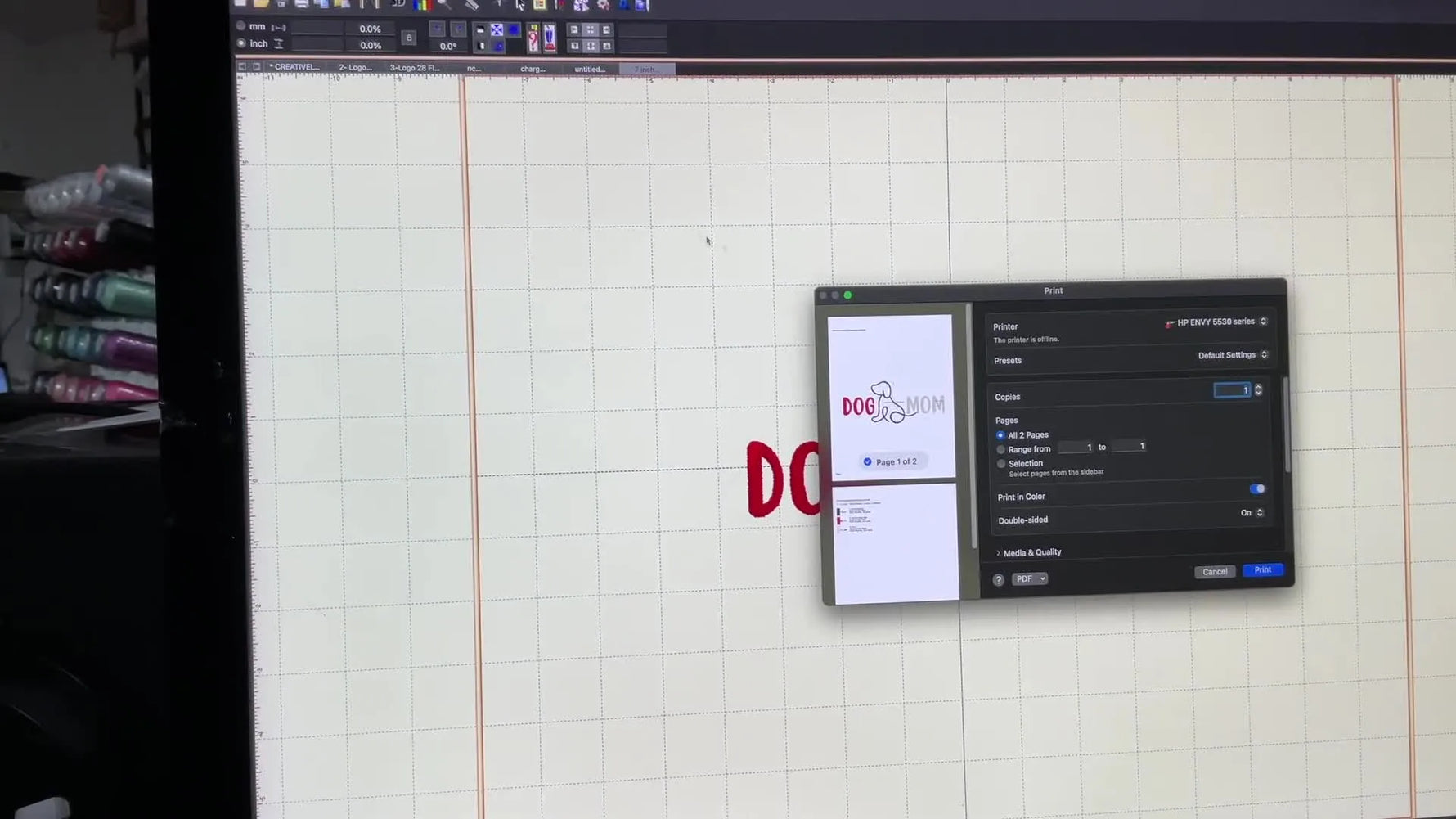 A multi-needle embroidery machine touchscreen displays the loaded design and the color-to-needle assignment grid ready to be programmed.