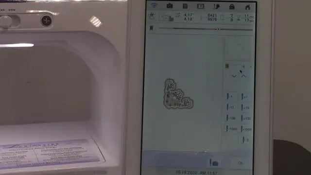 A close-up of the Luminaire XP1 screen showing the appliqué conversion steps, including the scissor icon that marks the trim stage.