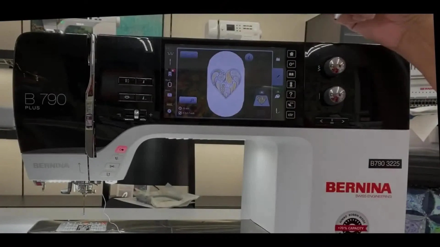 A wide view of the BERNINA B 790 PLUS with the elephant design loaded and the left sidebar settings visible for quick embroidery setup checks.