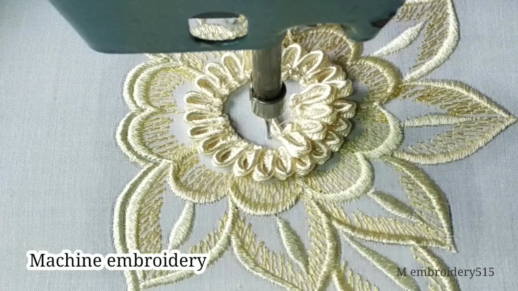 Machine embroidering a flower with a 3D center.