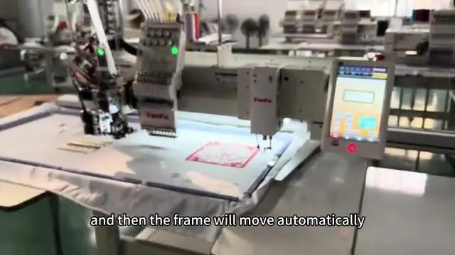 The large sash frame auto-moves across the YunFu table to center under the active head during initialization.