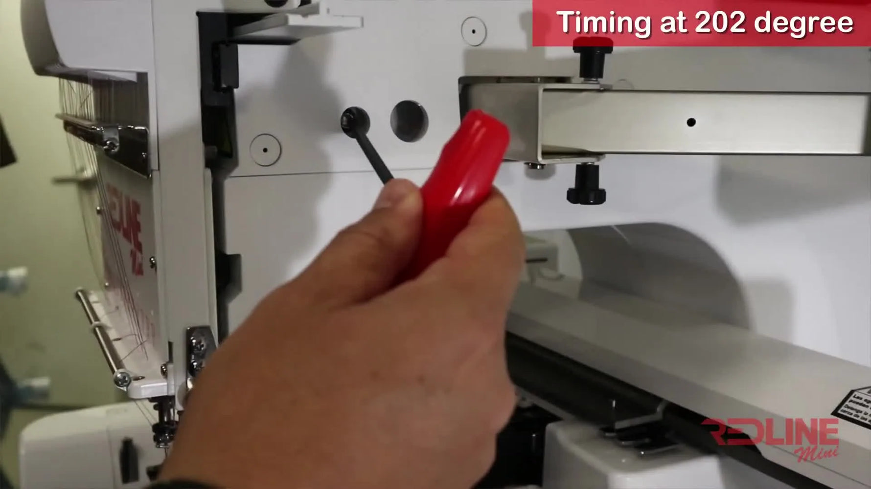 A close view of the Redline Mini side panel while the main shaft is set to 202 degrees for rotary hook timing.