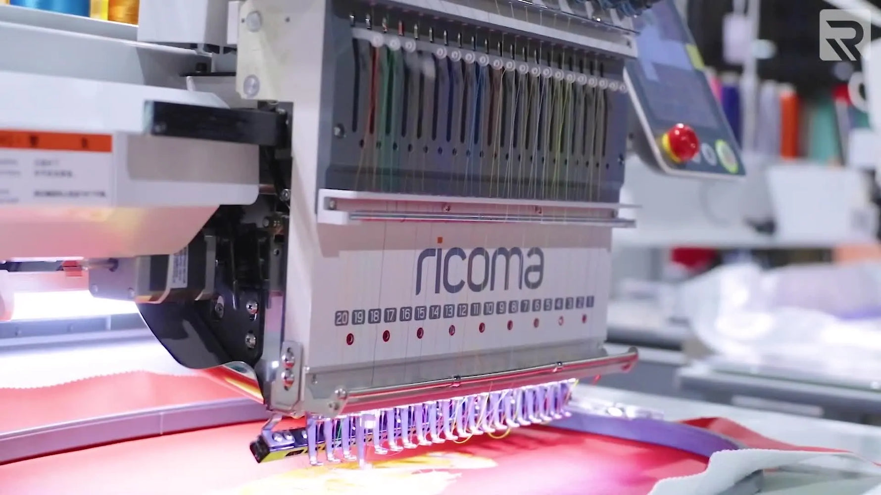 Close-up of the Ricoma MT-2001-8S needle bar showing the full 20-needle lineup, highlighting why color capacity and setup strategy matter in production.