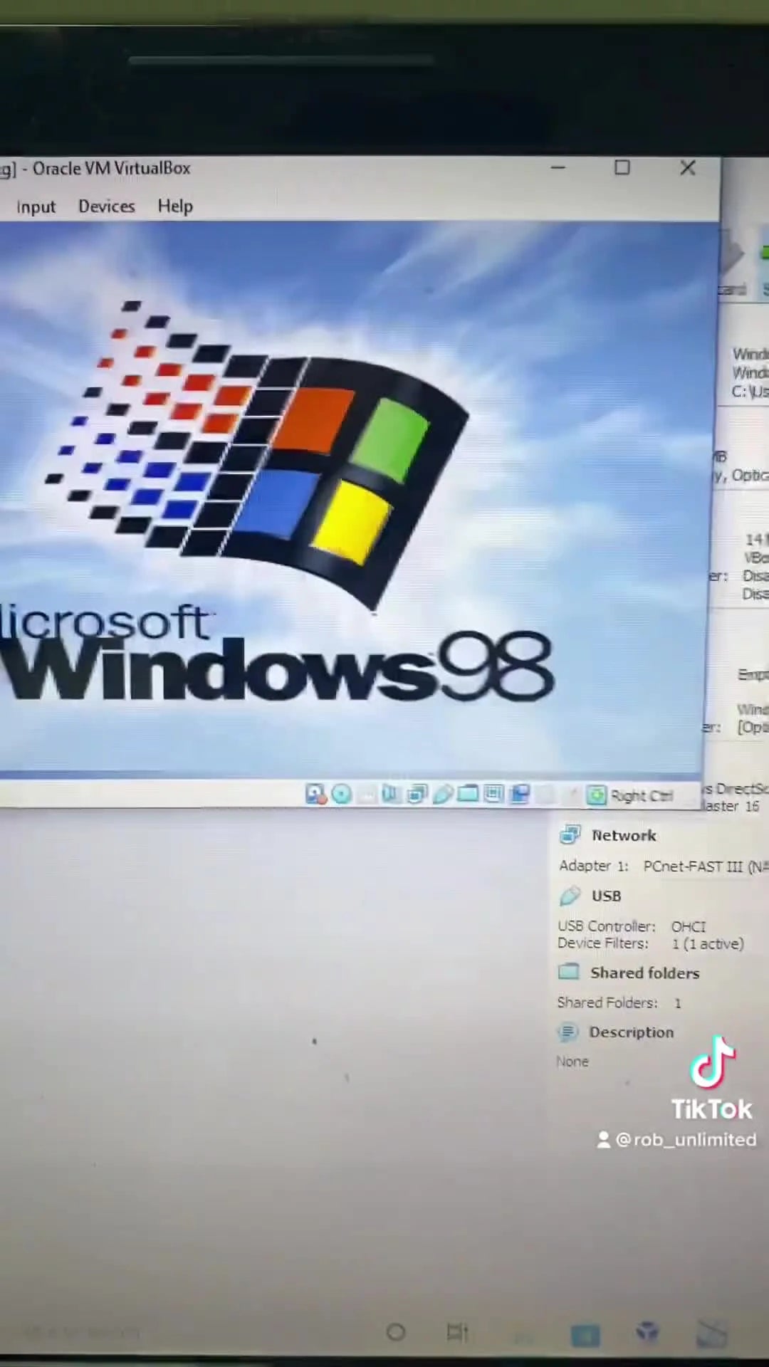 A Windows 98 boot screen running inside a VirtualBox window, confirming the legacy environment is successfully launching on a modern PC.