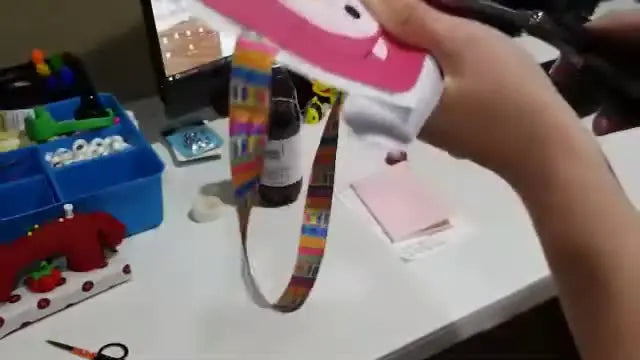 A finished ITH owl book band with colorful fold-over elastic and a clean vinyl-backed edge, ready to wrap around a planner.