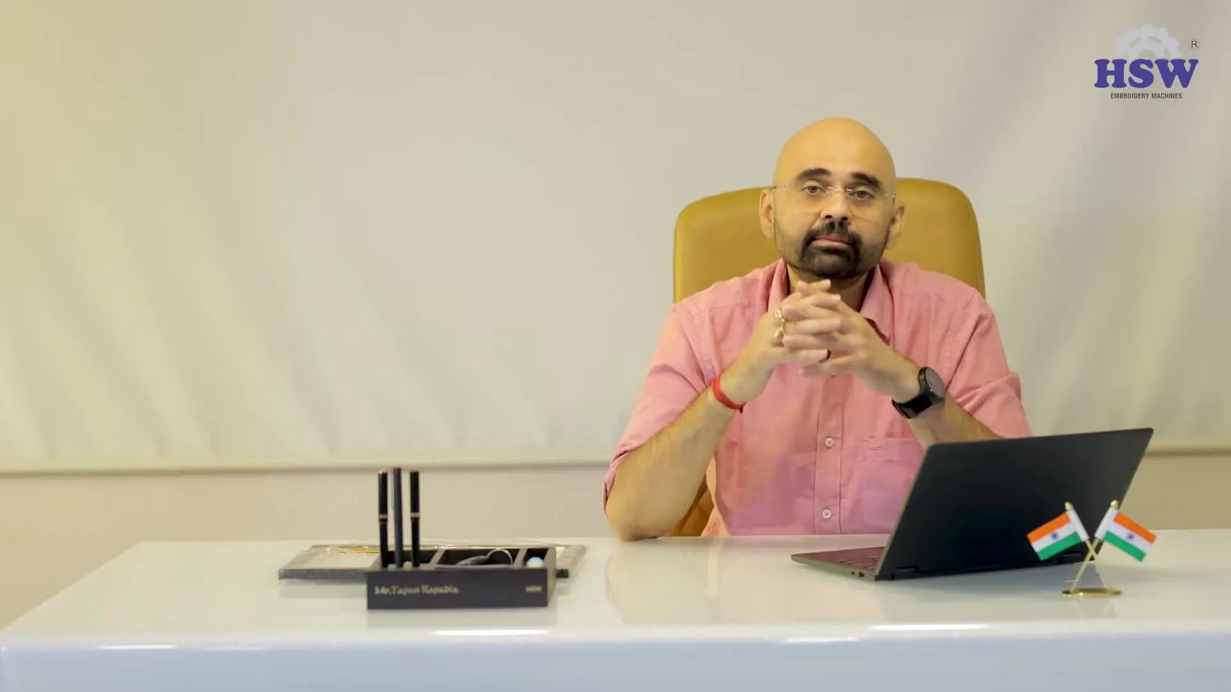 The presenter speaks directly to camera, emphasizing the importance of choosing a local authorized HSW dealer for faster service and safer ownership.