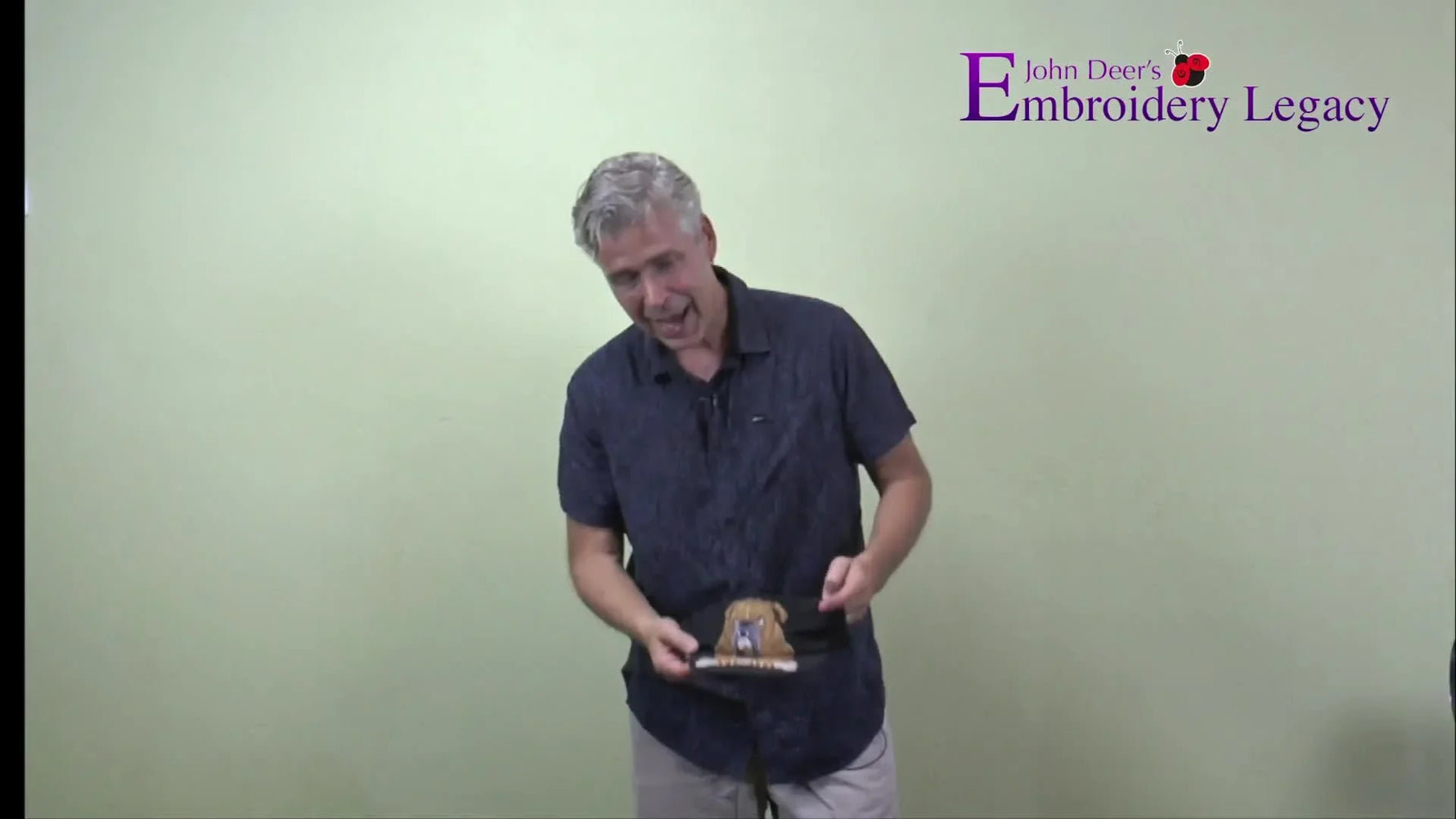 John reveals the finished black cap featuring an extreme high-relief bulldog embroidery built up to a 6mm 3D puff effect.