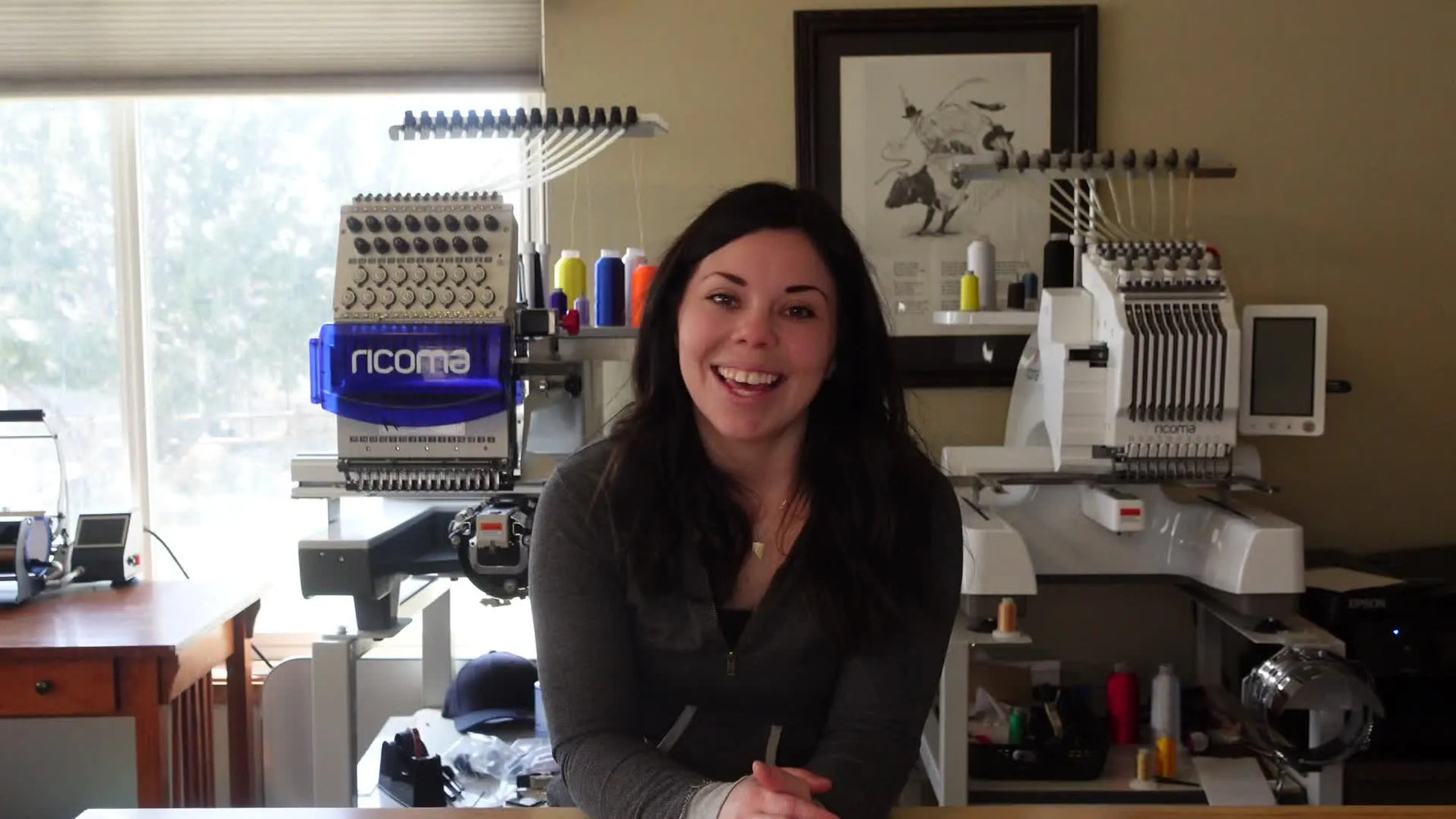 Kayla explaining the CYB form in her embroidery studio.