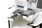 Hoopsteady support platform installed beneath a Brother multi-needle embroidery machine.