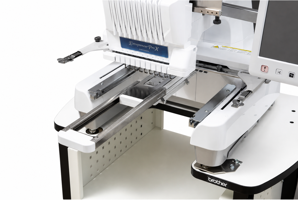 Hoopsteady support platform installed beneath a Brother multi-needle embroidery machine.